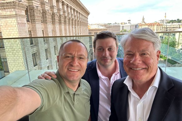 Ukrainian ambassador to Australia, Vasyl Myroshnychenko, with former Victorian MP Tim Smith and one-time Australian consul-general to New York Alastair Walton in Kyiv on Tuesday.