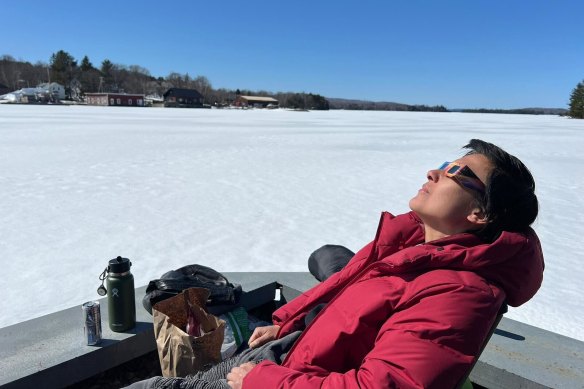 Farrah Tomazin preparing to view the solar eclipse in Greenville, Maine.