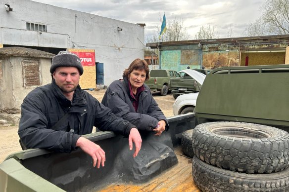 Claire Oelrichs and her son Cooper in Lviv at the Car For Ukraine workshop.