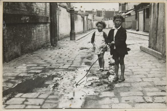 Entrance to a slum pocket known as Carlow Place in Carlton in the 1930s.