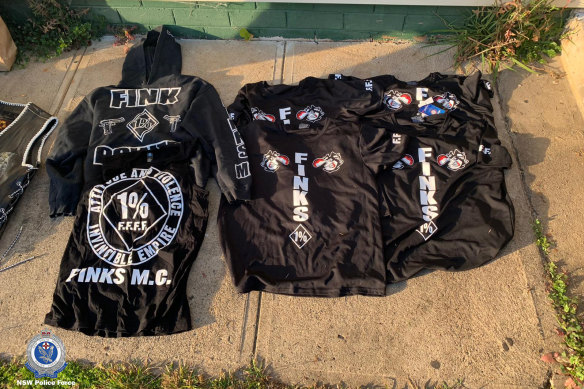 Finks paraphernalia was seized in a police operation targeting three bikies who allegedly extorted a north-west Sydney shopkeeper. 