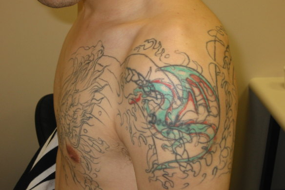 Chin Kwang Lee in custody in 2003 - dragon tattoo.