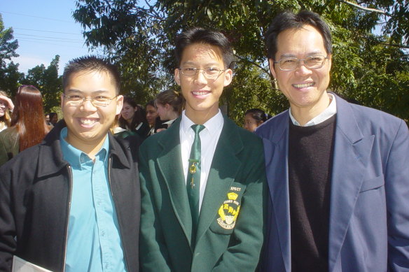 Eddie Woo, centre,  flanked by his brother and father, in his James Ruse days.
