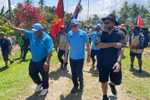 Prime Ministers James Marape and Anthony Albanese with Governor of Oro Province Gary Juffa begin the walk of the Kokoda Track.