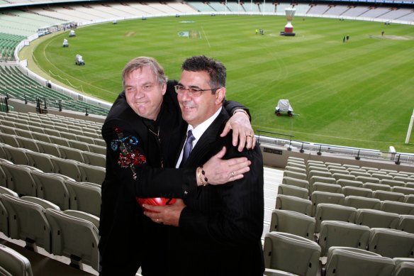 Singer Meat Loaf with former AFL chief executive Andrew Demetriou before the 2011 grand final.