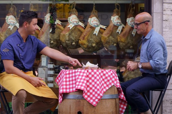 Stanley Tucci shares a meal in Searching for Italy.