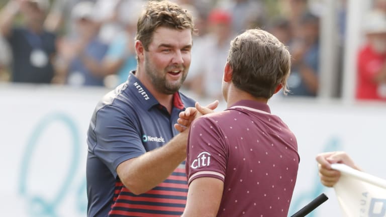 No hard feelings: Marc Leishman congratulates good friend Cameron Smith on his win.