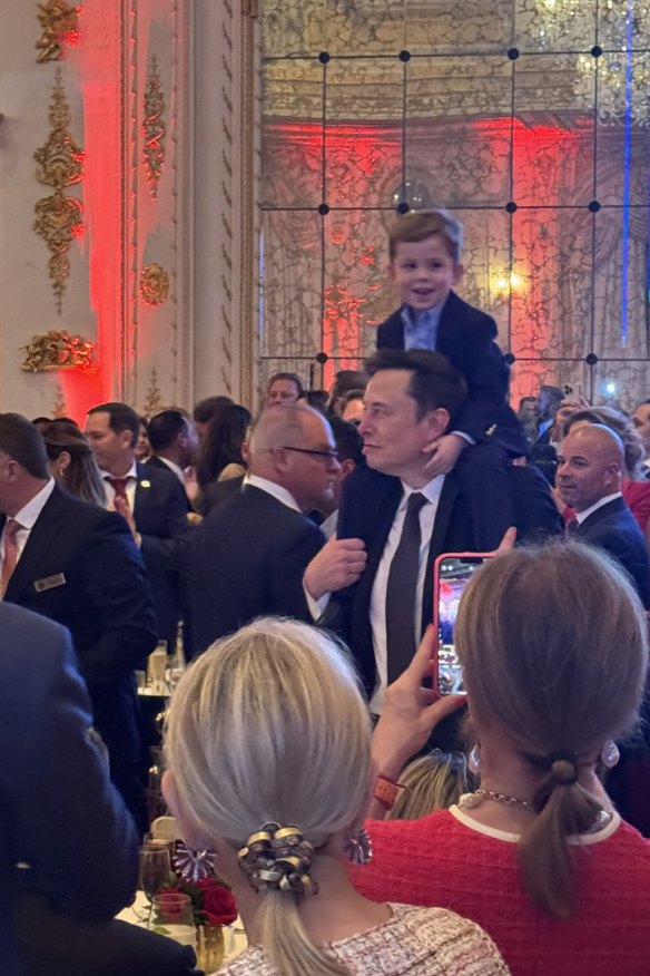 Elon Musk and his son,  X Æ A-Xii, as the 2024 US presidential election results are broadcast at Mar-a-Lago.  