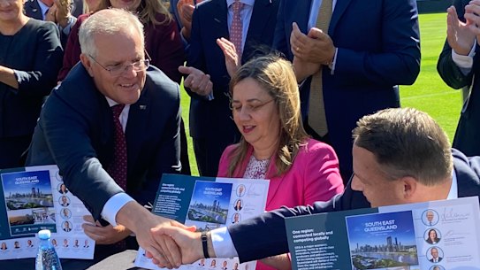 Prime Minister Scott Morrison, Queensland Premier Annastacia Palaszczuk  and Brisbane lord mayor Adrian Schrinner signing the SEQ City Deal at the Gabba.