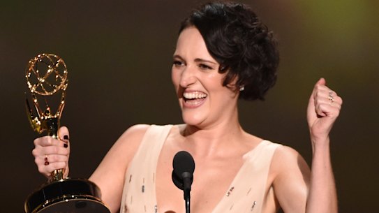 Phoebe Waller-Bridge accepts the award for outstanding writing for a comedy series for Fleabag.