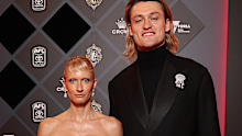 Darcy Moore of the Magpies and partner Dee Salmin at the 2025 Brownlow Medal.