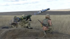 Ukrainian soldiers use a launcher with US Javelin missiles during military exercises in the Donetsk region on Wednesday.