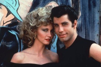 Oh, Sandy! Olivia Newton-John in character for the musical Grease with co-star John Travolta.