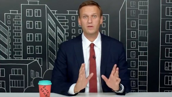 Russian opposition leader Alexei Navalny speaks as he records a speech about his investigation into large-scale corruption at the National Guard. Foundation, in August.