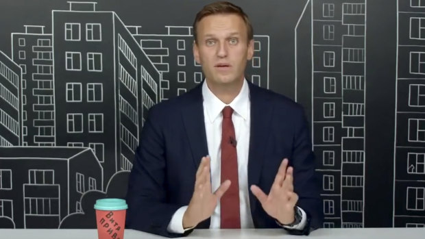 Russian opposition leader Alexei Navalny speaks as he records a speech about his investigation into large-scale corruption at the National Guard. Foundation, in August.