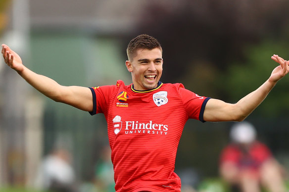 Nathan Konstandopoulos is all smiles after scoring for Adelaide United.