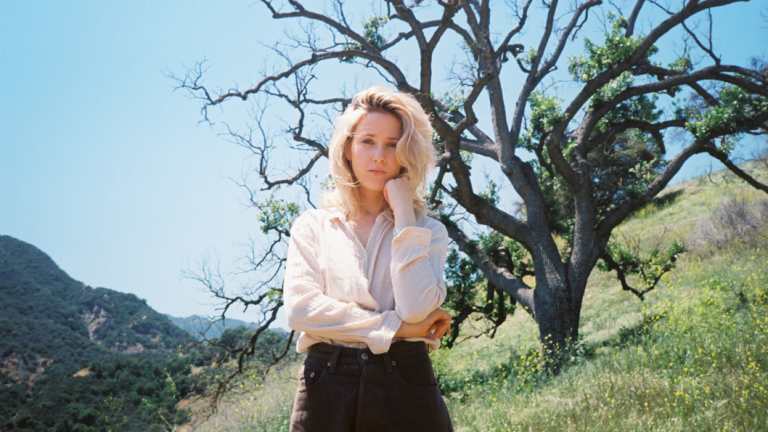 Emma Louise uses an electronic voice-pitching device to change her vocal sound on the album Lilac Everything.