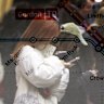 Commuters are seen set against a transport map in an in-camera multiple exposure at the Metro Station at Epping.