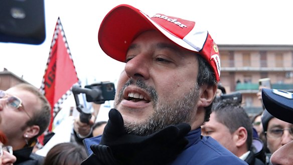 Centre of the storm: Matteo Salvini, leader of the League party greeting well-wishers. 