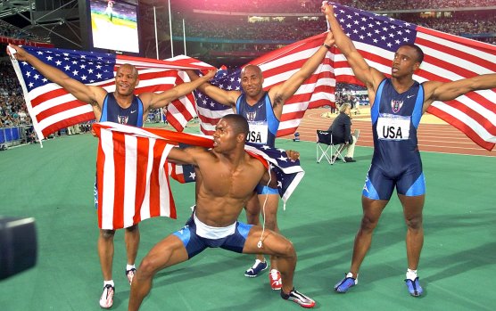 Maurice Greene, Brian Lewis, Jonathan Drummond and Bernard Williams III celebrate their relay gold.