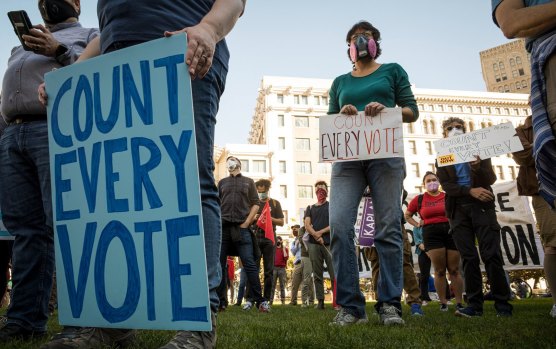Demonstrators call on authorities to "Count Every Vote" at a protest in California on Wednesday. 
