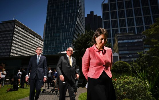 Gladys Berejiklian, Brad Hazzard and Dominic Perrottet front the media on October 13.