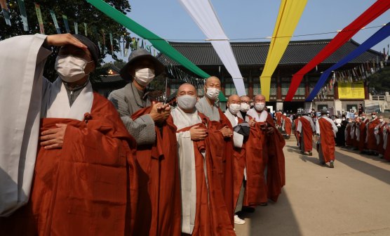 South Korean buddhist monks welcome pilgrims at Bongeun Temple in Seoul this week.