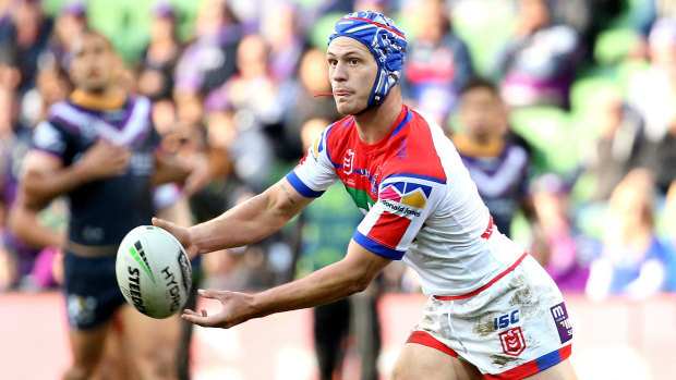 Friend to foe: Kalyn Ponga distributes for the Knights. If Pearce is selected for the Blues, Ponga will present a significant challenge.