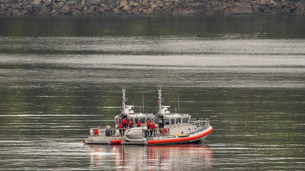 Two US Coast Guard response boats search George Inlet on Tuesday. 