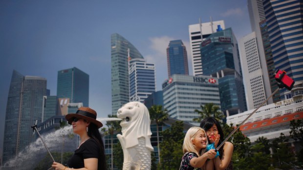 Singapore is the canary in the coal mine, warn economists.