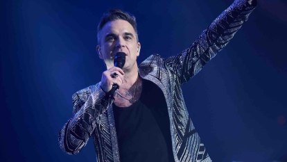 My night with Robbie Williams, a Tom Jones impersonator and thousands of Shane Warne fans