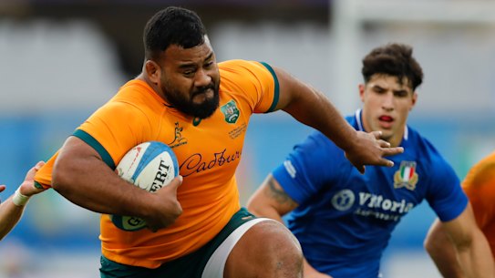 Taniela Tupou bursts past Stephen Varney during last year’s clash with Italy.