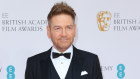 Kenneth Branagh at the BAFTAs wearing Dolce & Gabbana with some subtle engineering to lengthen and slim his frame.