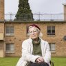 Clare Hanson in front of part of the Ascot Vale housing estate on Friday.