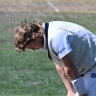 Will Pucovski after he was struck by a ball from Riley Meredith on Sunday.