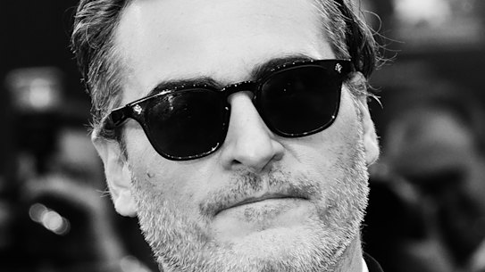 Joaquin Phoenix walks the red carpet at Venice.