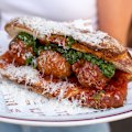 Mortadeli’s meatball sub with basil pesto and parmigiano.