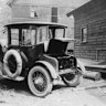 An electric automobile charging during a tour from Seattle to Mount Rainier in 1919.