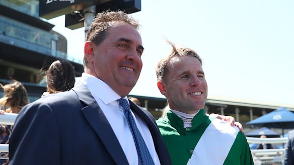 Trainer Michael Freedman with jockey Tommy Berry after Manaal won the Gimcrack Stakes at Randwick in 2023.