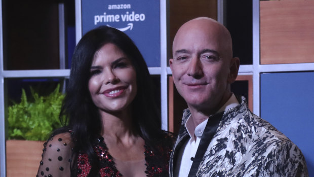 The glamour days are over: News anchor Lauren Sanchez and Amazon CEO Jeff Bezos in January.