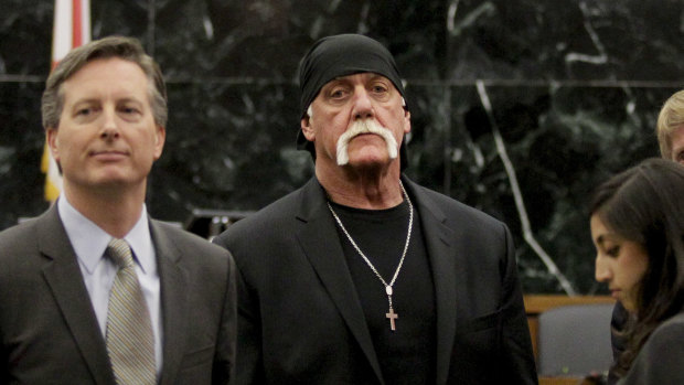Hulk Hogan, whose given name is Terry Bollea, centre, looks on in court in 2016 moments after a jury returned its decision. Hogan sued Gawker for invasion of privacy and, bankrolled by tech billionaire Peter Thiel, won a $US140 million judgment that led to Gawker's bankruptcy filing.