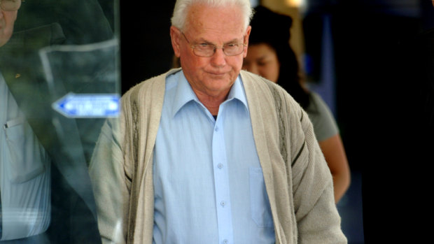 John William Chute (centre), also known as Brother Kostka, leaves court in 2008.