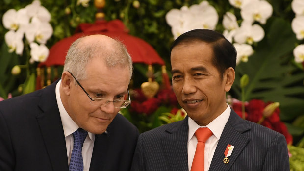 Australian Prime Minister Scott Morrison and Indonesian President Joko Widodo at their deal signing ceremony on Friday.