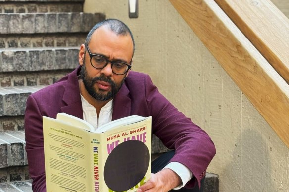 Musa al-Gharbi with his new book.