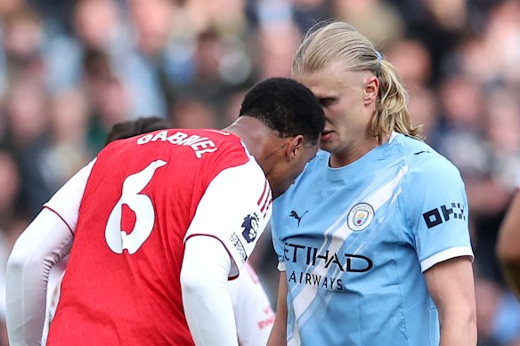 Arsenal defender Gabriel and Erling Haaland get up close and personal.