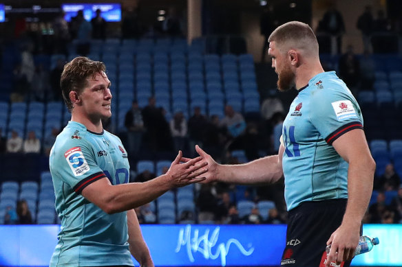 Michael Hooper shakes hands with Lachlan Swinton after the Waratahs’ loss to Moana.