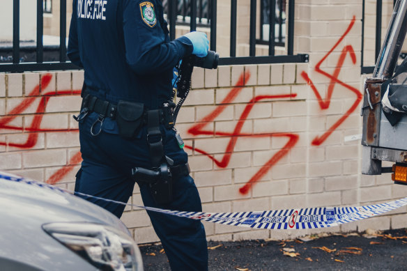 Police investigating an attack on Newtown Synagogue in January. 