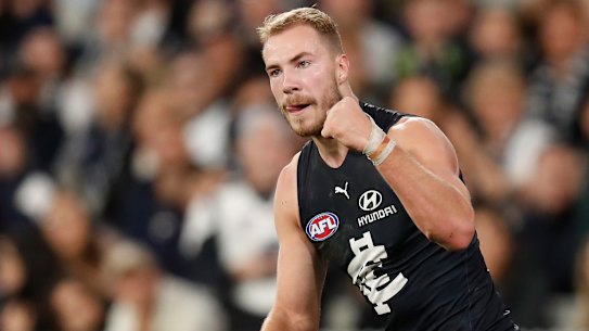 Blues forward Harry McKay celebrates a goal.
