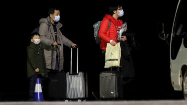 Australians evacuated from Wuhan arrive on Christmas Island on Thursday.