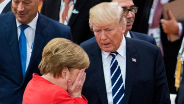 German Chancellor Angela Merkel with US President Donald Trump prior to the first working session on the first day of the G-20 summit in  Germany last year.